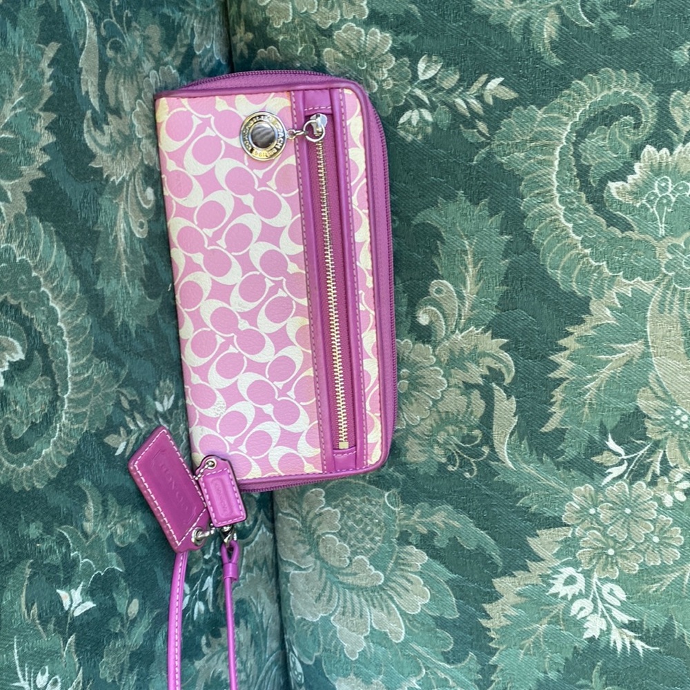 This is a genuine coach, large wristlet, or wallet